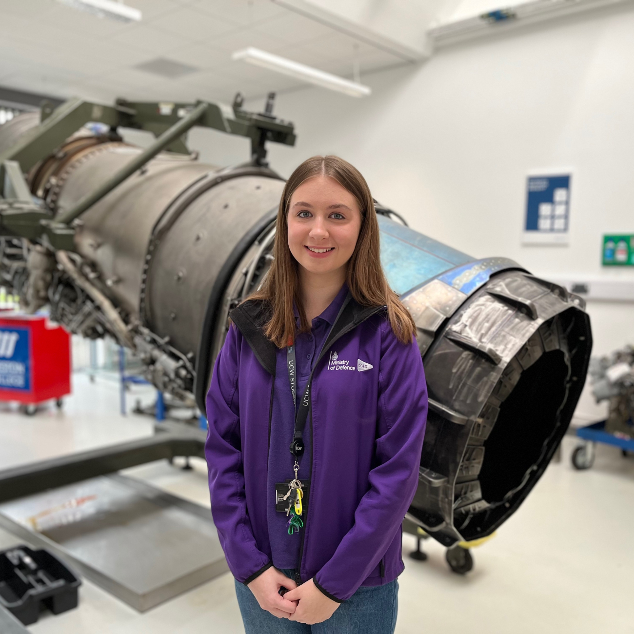 Georgia stood in front of engine, smiling