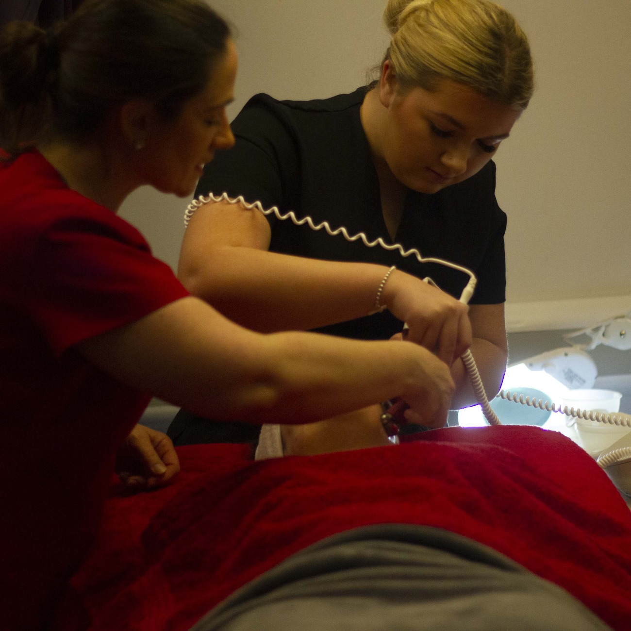 Learner taking part in demonstration with Guinot
