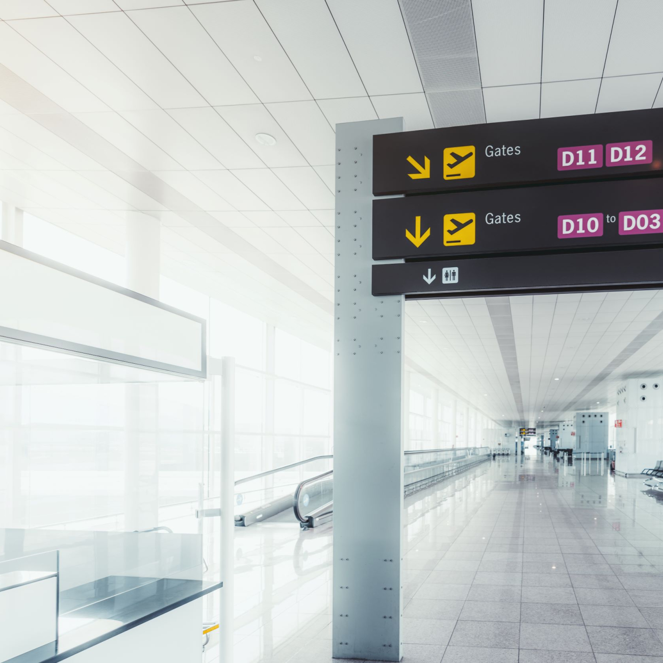 Airport signage, with gate information displayed