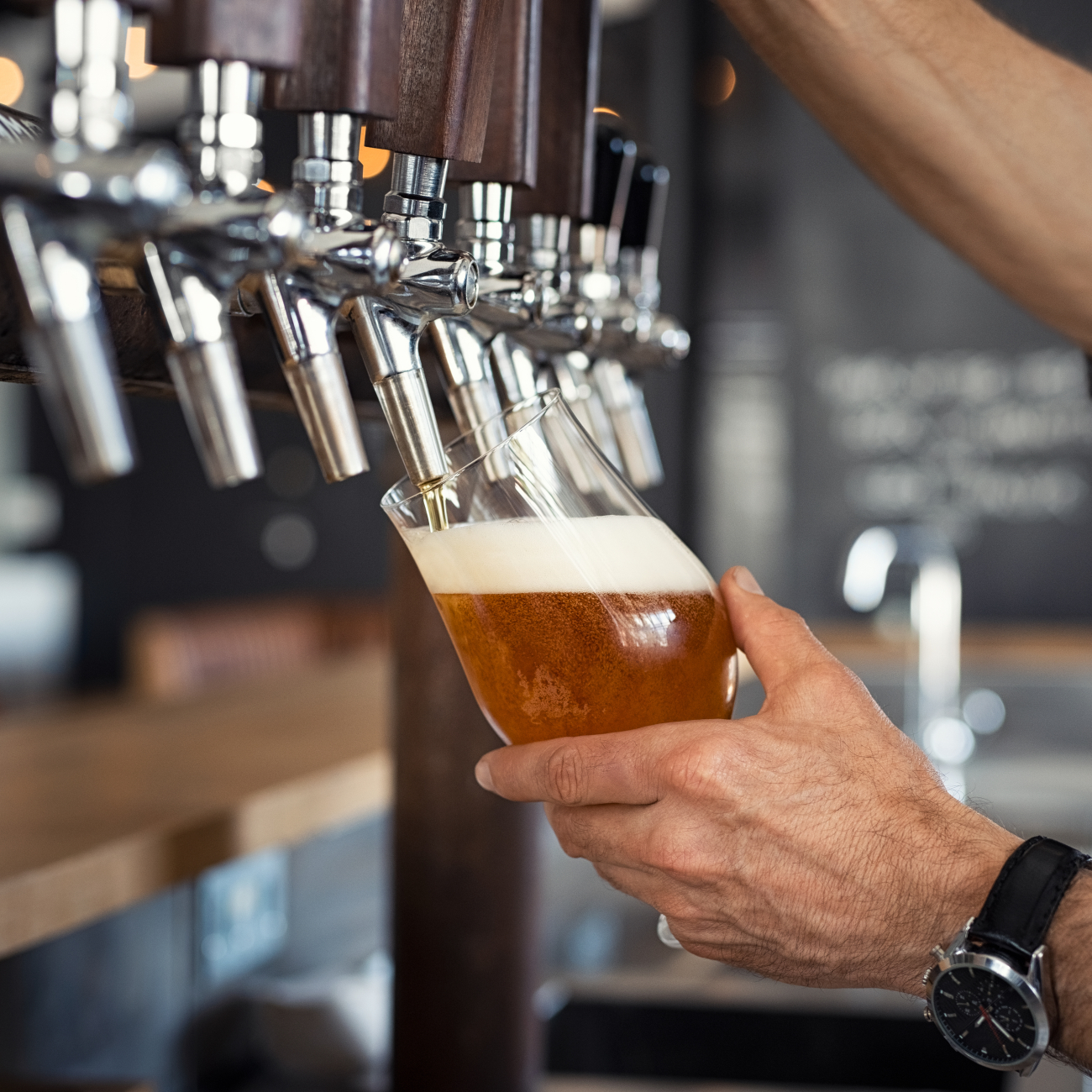 Pouring beer into glass