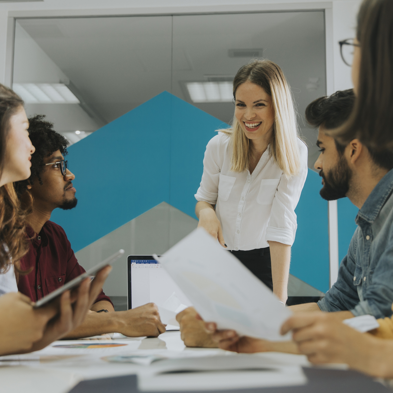 leadership and management professionals in meeting room