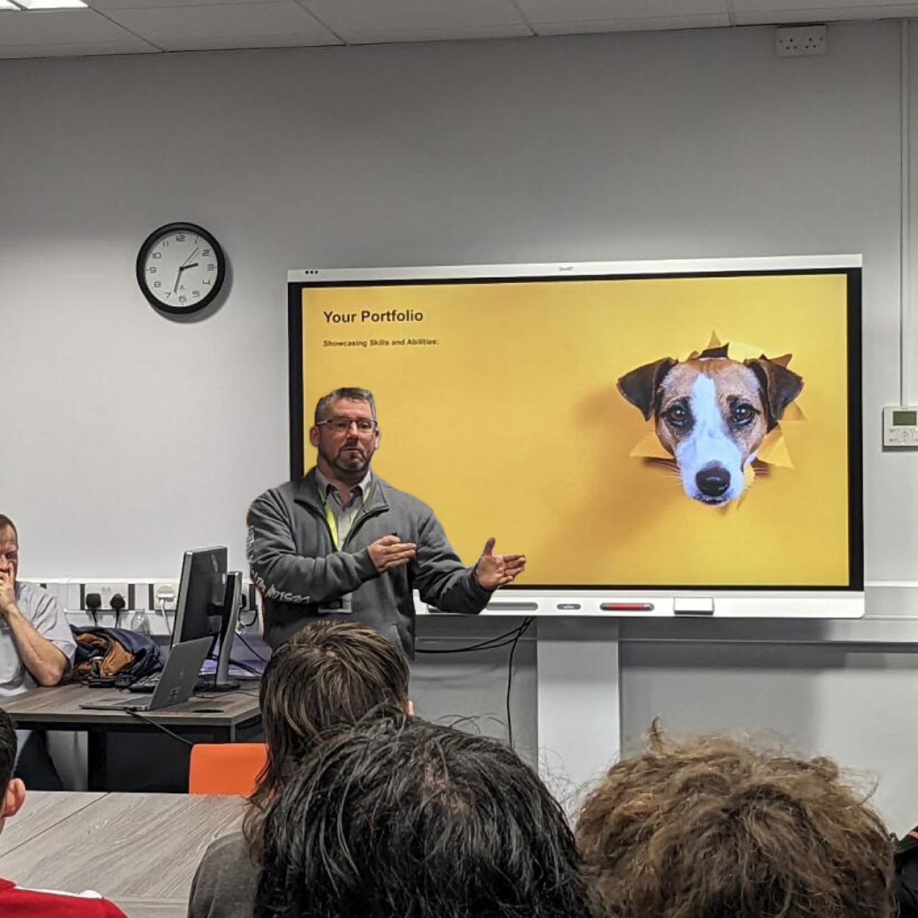 Twisted Web delivering a guest lecture at Weston College, man stood at front of class