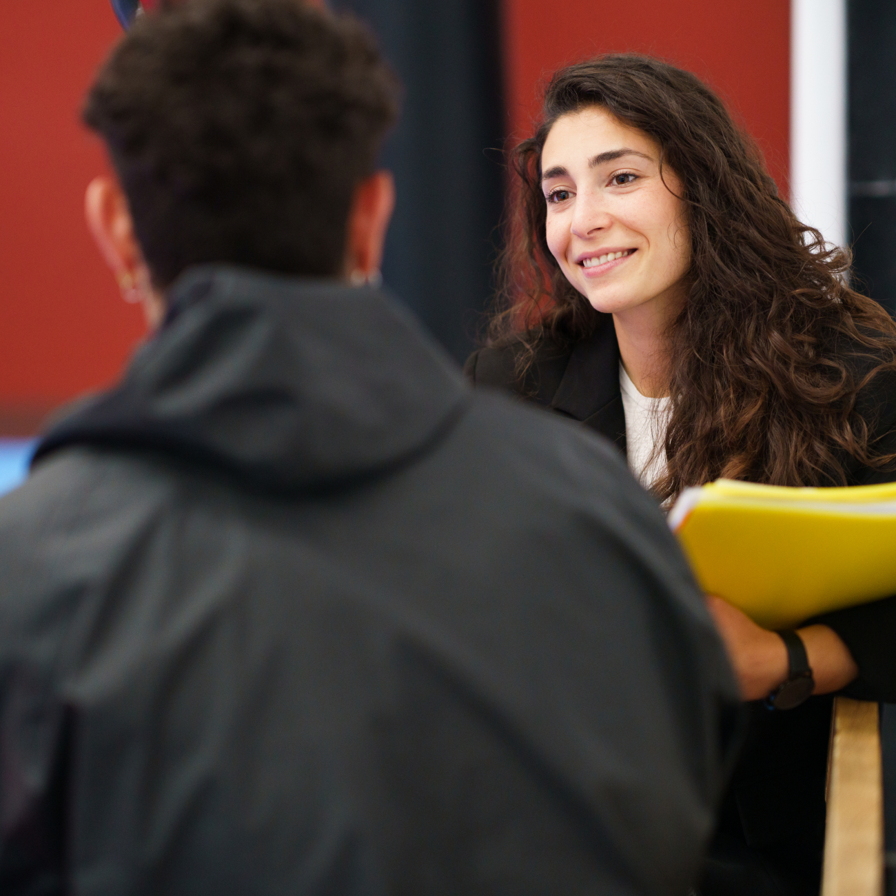 Careers advisor speaking to student