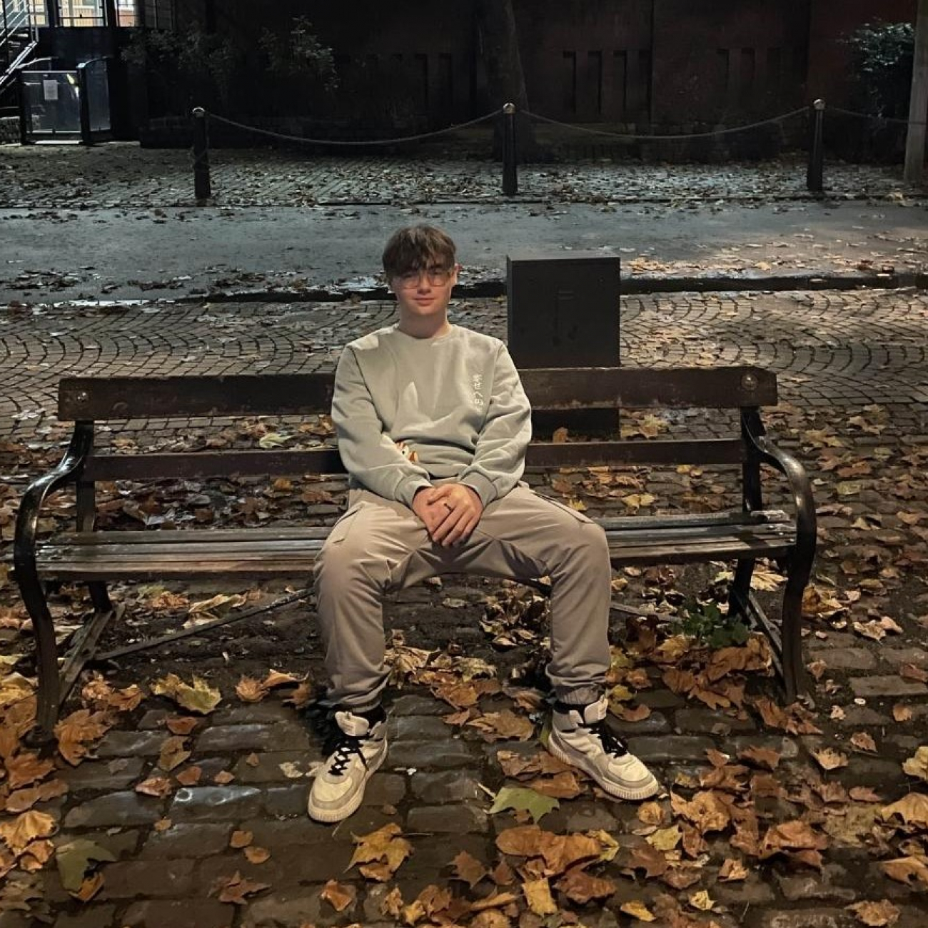 Callum sitting on a bench