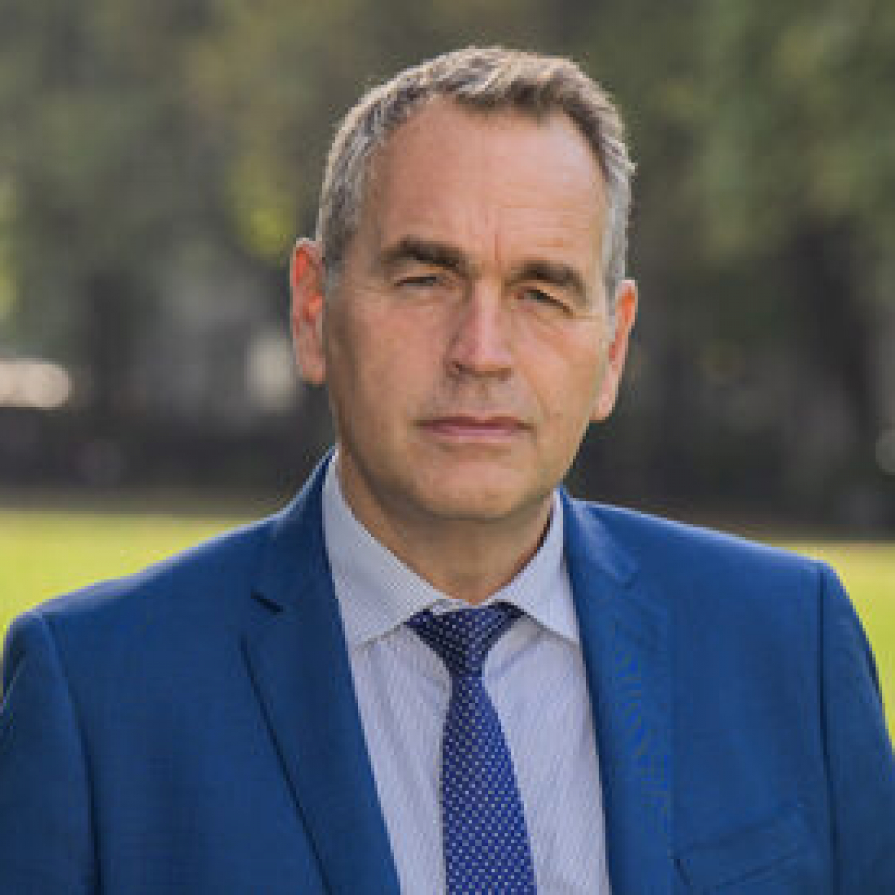Lee Elliot Major standing in a field looking serious
