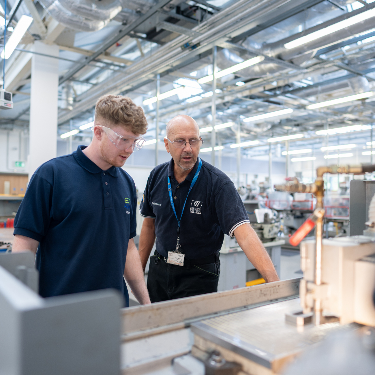 Engineering teacher supporting learner