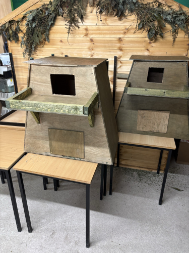 2 birdhouses made by the students