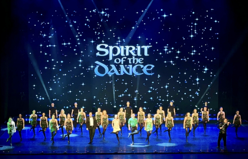 Joe, Weston College's performing arts lecturer, in Beijing, China on stage performing with the rest of the cast