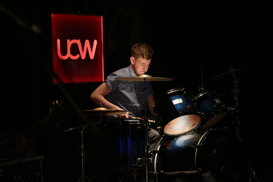 Music student playing the drums for Michael Eavis