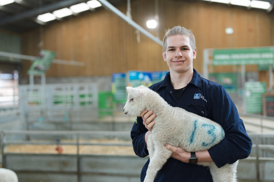 Luke holding a lamb