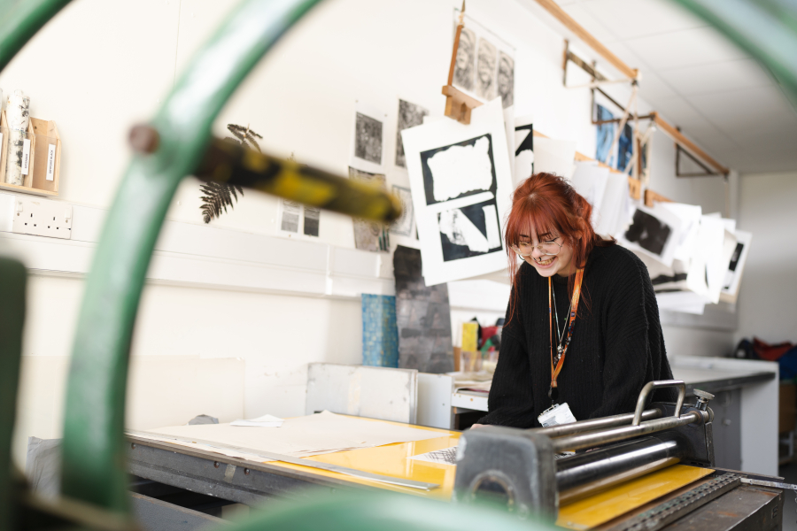 art student smiling in practical lesson