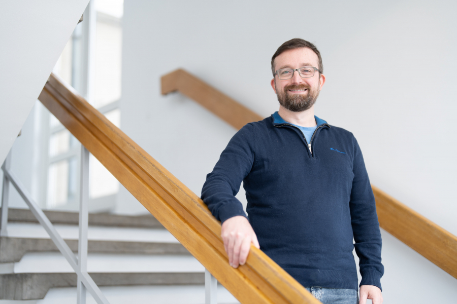 Richard standing on stairs