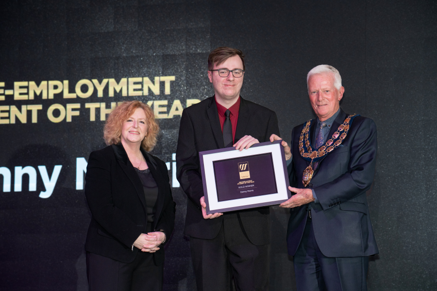 Danny collecting award